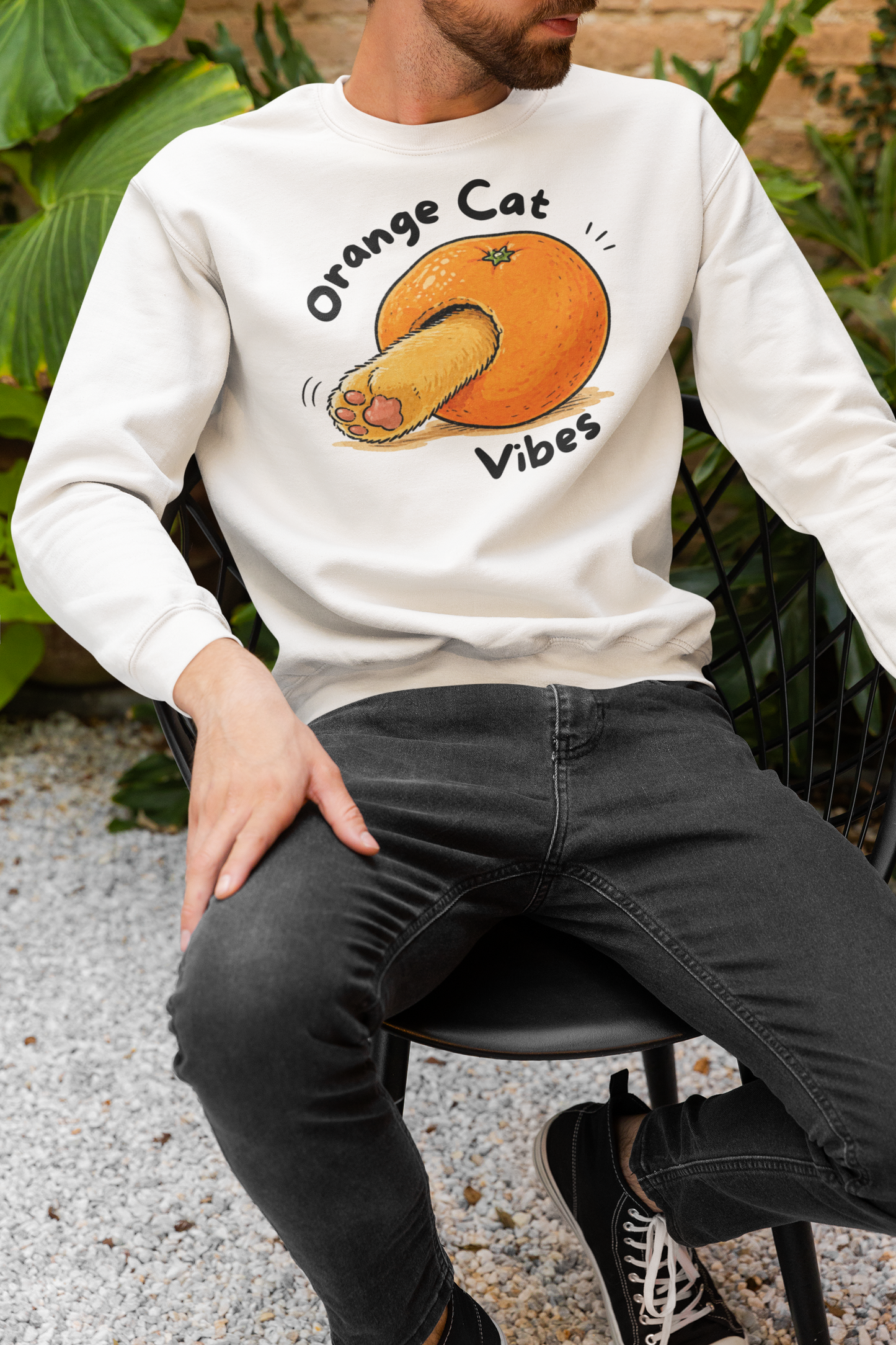 Man wearing Orange Cat Vibes Sweatshirt – cute orange cat graphic crewneck for cat lovers | WhiskersMethod
